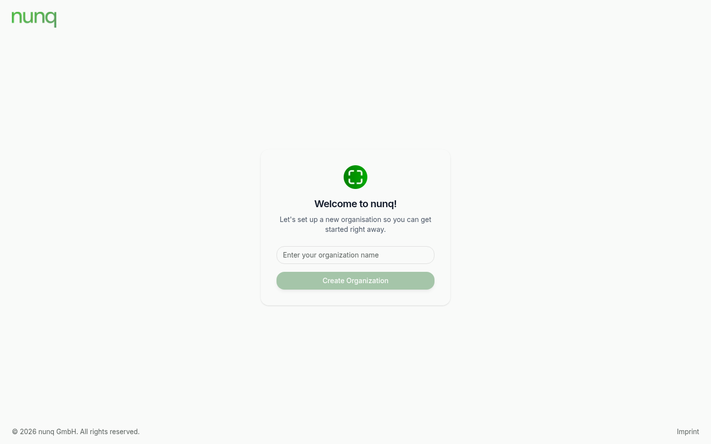 Onboarding screen "Welcome to nunq" with an organization-name input field